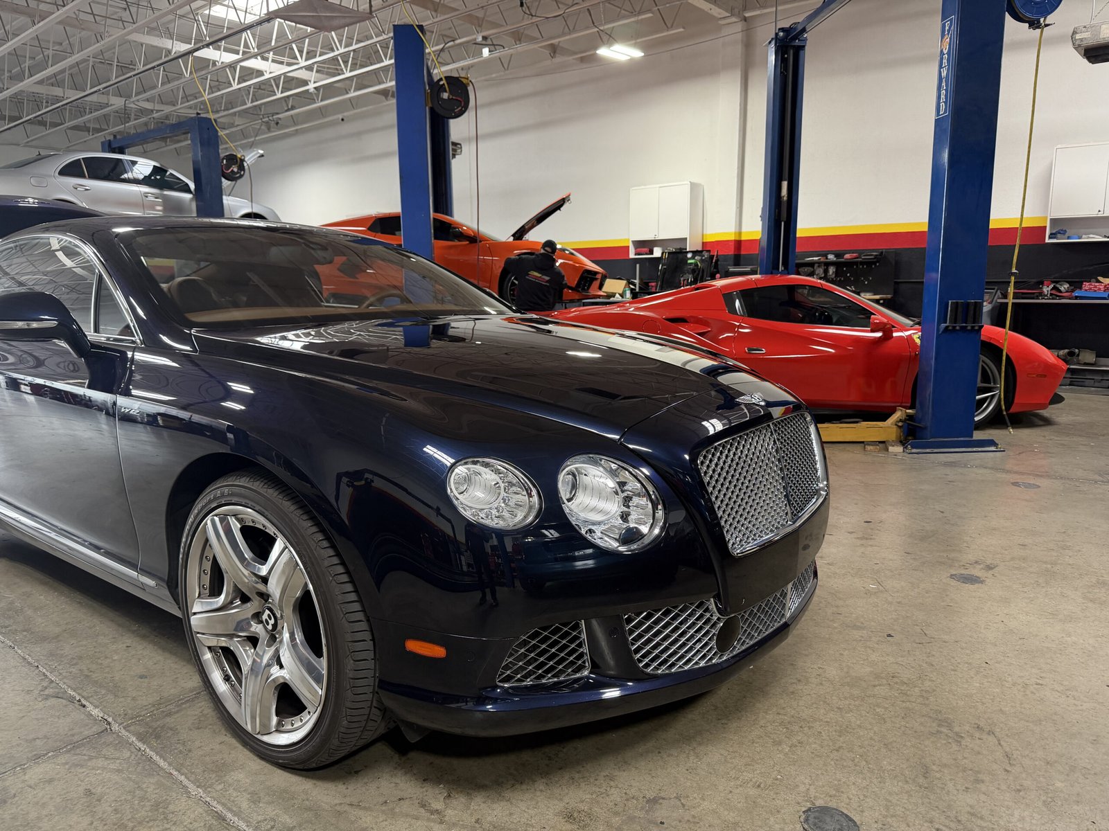 Bentley Continental GT in the Eurohaus Motorsports service bay