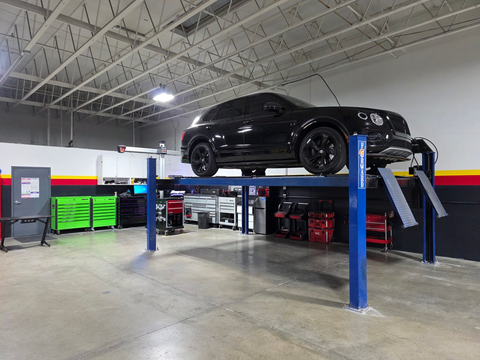 Vehicle on a lift at Eurohaus Motorsports in Las Vegas